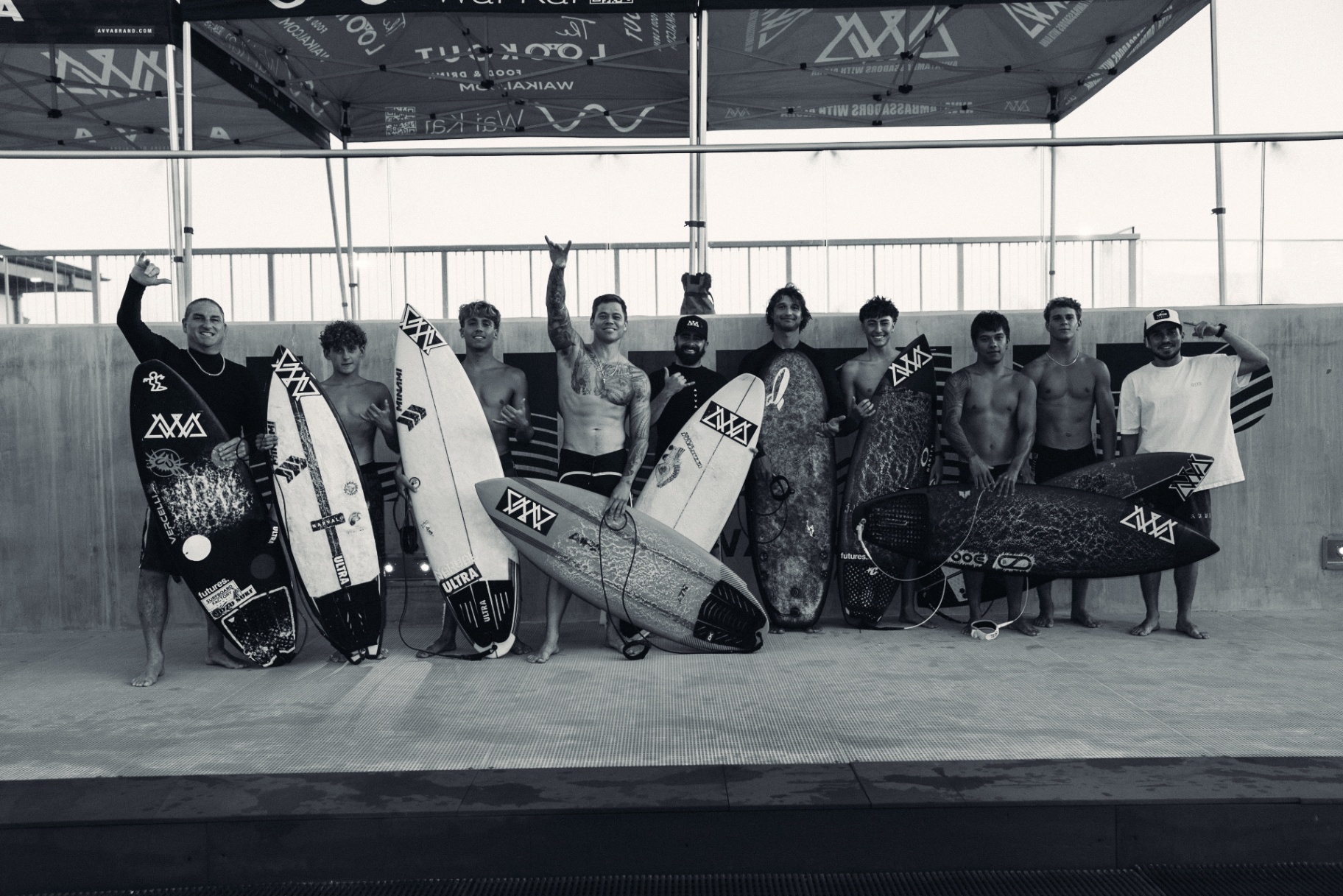 The full AVVA crew lined up with their boards