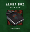 The AVVA Aloha Box only $99. 5 t-shirts and 1 hoodie on a camouflage rectangle and a green distressed background.