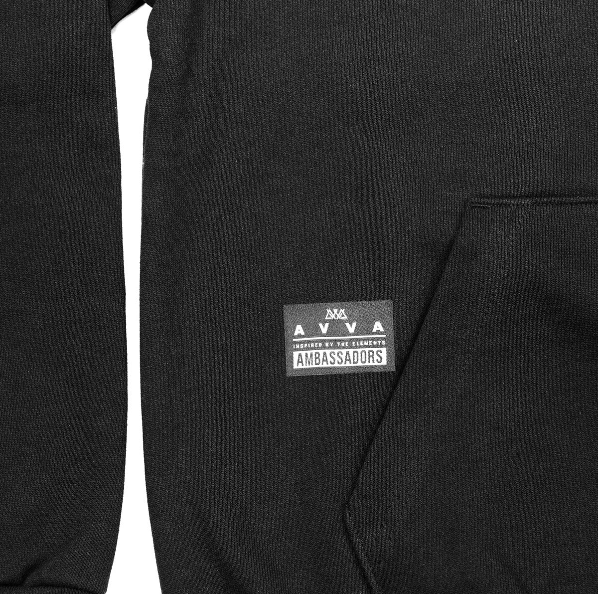 CLOSE UP VIEW OF AVVA PATCH ON NTHE HOODIE