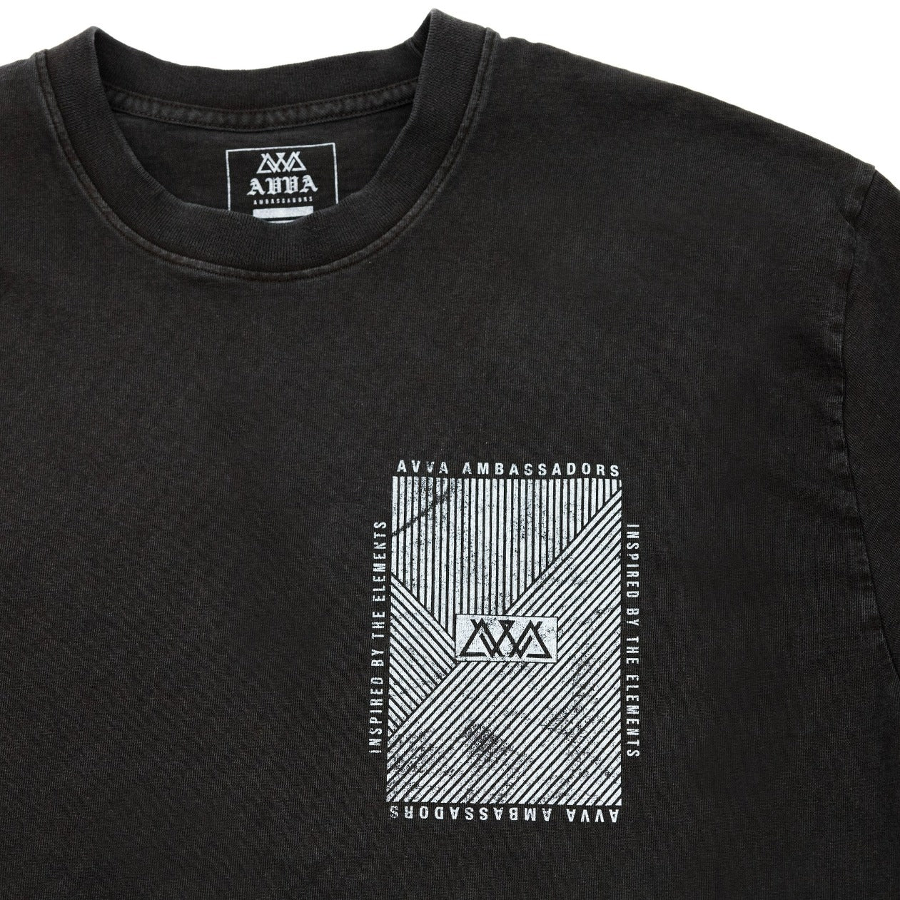 FRONT CLOSE UP VIEW OF HEAVYWEIGHT CLIMATE LONG SLEEVE. HIGHLIGHTING AVVA AMBASSADORS INSPIRED BY THE ELEMENTS LOGO IN TOP RIGHT.