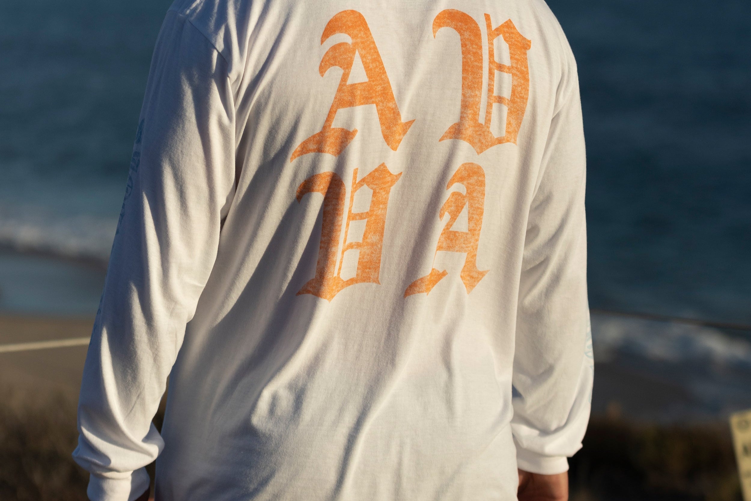 model wearing sun fade long sleeve