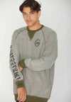 FRONT VIEW OF ALL NATIONS REVERSIBLE CREW ON MODEL. SHOWING THE INSIDE OF THE SWEATSHIRT, PALE GREEN.