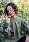 FEMALE MODEL WEARING ALL NATIONS REVERSIBLE CREW