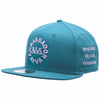 QUARTER IMAGE OF REPRESENT SHARK TEAL HAT. LIGHT LAVENDER AVVA EMBROIDERY ON FRONT AND MOTTO ON SIDE