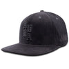 QUARTER VIEW OF PRODUCT IMAGE OF APO BLACK CORDUROY HAT. FRONT AND SIDE LOGO EMBROIDERY.