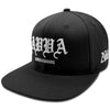 QUARTER VIEW OF PRODUCT IMAGE OF AMBASSADORS BLACK HAT.FRONT AND SIDE LOGO EMBROIDERY.