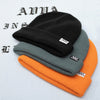 PRODUCT IMAGE OF ALL 3 COLORS OF CHASE BEANIE. BLACK, SUNSET ORANGE AND PACIFIC STEEL.
