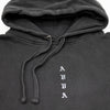 CLOSE UP VIEW OF FRONT LOGO SCREEN PRINT OF DISCOVER BLACK PIGMENT FLEECE HOODIE.