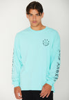 MODEL FACING FORWARD WEARING BEACH STREETS MINT LONG SLEEVE TEE IN STUDIO