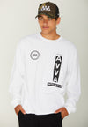 FRONT VIEW OF MODEL WEARING CHAZ MOSAIC WHITE LONG SLEEVE TEE. IN STUDIO. ALSO WEARING FRANKLIN CAMO HAT
