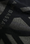 EXTREME CLOSE UP OF BACK SCREEN PRINT DETAIL. BLACK ON BLACK DETAIL.