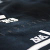 EXTREME CLOSE UP SCREEN PRINT DETAILS OF RIDERS OF ALOHA CREW FLEECE